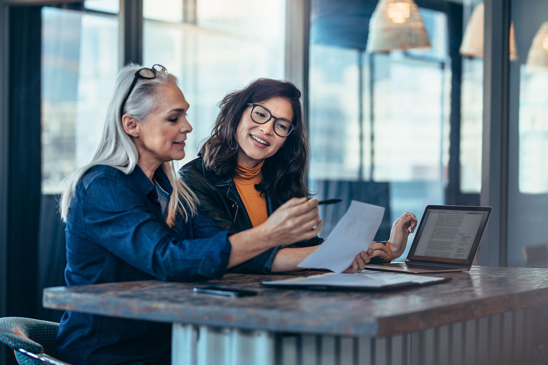 Two women discussing financial planning